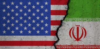 Split image of United States and Iran flags divided by a cracked seam