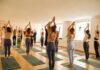 When Wellness Advice Gets Overheated Group of individuals practicing yoga in a studio