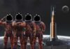 Could Astronauts Sleep Through A Mars Mission? Four astronauts in orange suits standing in front of a rocket with the moon in the background