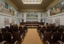 Appeals Court Delivers A Setback For Trump Interior view of a courtroom with wooden benches and large murals