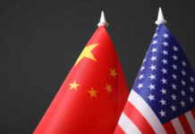 Trump’s New Election Claims Meet Beijing’s Denial Chinese and American flags side by side.