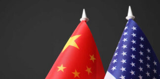 Chinese and American flags side by side.