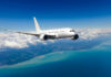 Scientists Spot A Troubling Trend Above The Atlantic Airplane flying over coastline and clouds in sky
