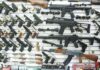 Texas Judge Pulls a Thread From Federal Gun Law Wall display of assorted firearms in a gun shop