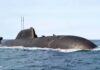 Submarine cruising on the ocean surface