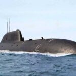 Submarine cruising on the ocean surface