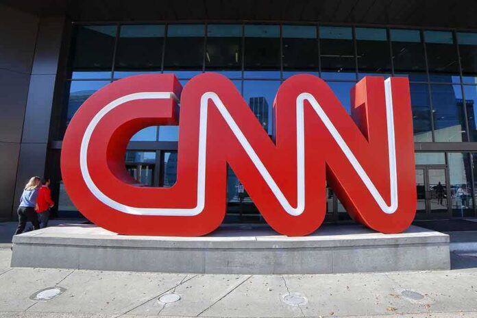 shutterstock_1568712067 CNN red logo sculpture outside a building entrance