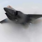 Stealth fighter jet piercing a vapor cloud
