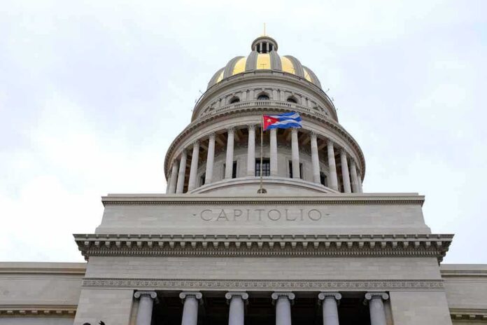 Capitol building dome with columns and a flag