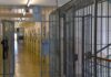 Illinois Board Says No—Death Follows Prison corridor with barred doors