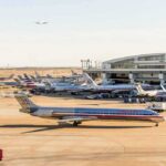 American Airlines jets at an airport terminal