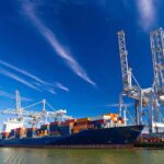 Black Sea Chaos Puts Turkey at the Gate Container ship docked at port with cranes loading cargo