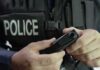 No Body Camera? ICE Says No Traffic Stop Police officer holding a body camera