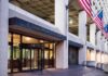 Power Play: President Above Records Law? J. Edgar Hoover FBI Building entrance with American flags