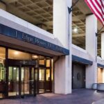 J. Edgar Hoover FBI Building entrance with American flags