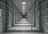 Public Safety Gamble – Who Let Them Out? empty prison corridor with barred cells