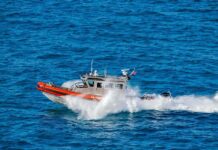 Lake Macbride Tragedy Ignites Parents’ Outrage coast guard patrol boat speeding across open ocean