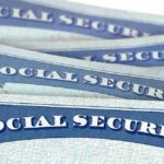 Social Security cards stacked in a close-up view