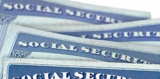 Social Security cards stacked in a close-up view