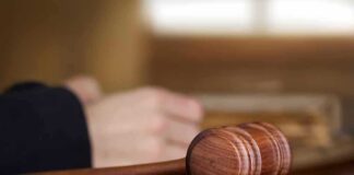 Wooden judge's gavel on sound block