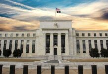 America’s Newest Dollar Coin Is Stirring Controversy Neoclassical government building with American flag at sunset