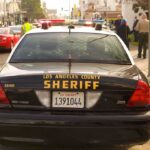 Sheriff patrol car parked on city street
