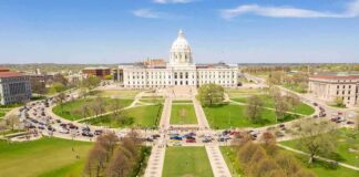 State capitol building with dome and surrounding lawns