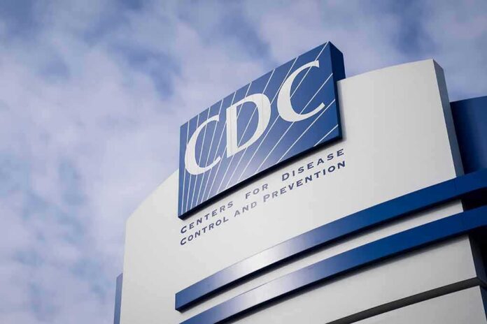 shutterstock_2123545061 CDC headquarters sign against a cloudy sky