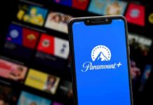 A Hollywood Giant Eyes the Exit Door Smartphone showing Paramount+ app on blue screen