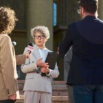 Spokesperson addresses reporters on courthouse steps