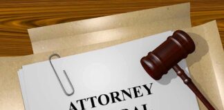 judge's gavel beside attorney general document on desk