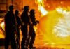 Death Penalty Shock: Trump Targets Firefighter Killers Firefighters battling a large blaze with a hose