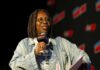 One Explosive Draft Claim Sparks An On-Air Clash Speaker with microphone on stage