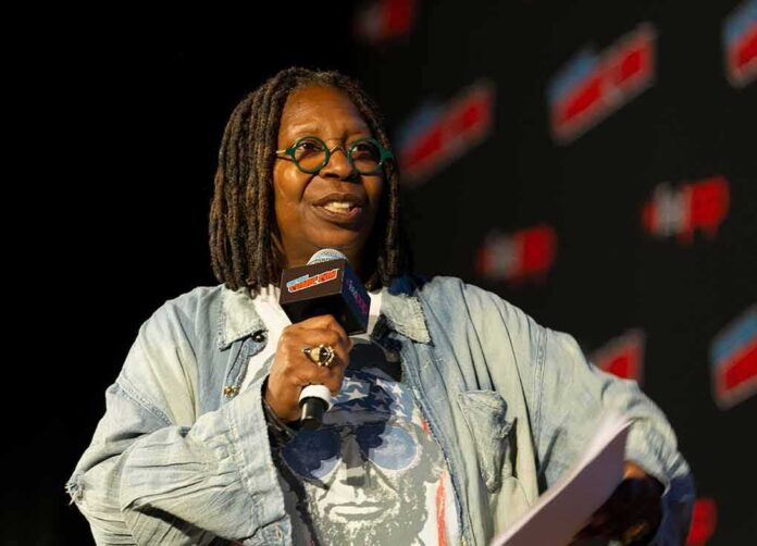 Speaker with microphone on stage