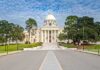 State capitol building with white dome and columns