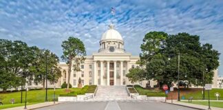 State capitol building with white dome and columns