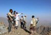One Tiny Strait Is Becoming a Major Battlefield Group of armed men standing on a rocky mountain ridge