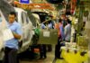 The Factory Floor Just Became a Political Stage Teddy Williams on an automotive assembly line with workers fitting car doors