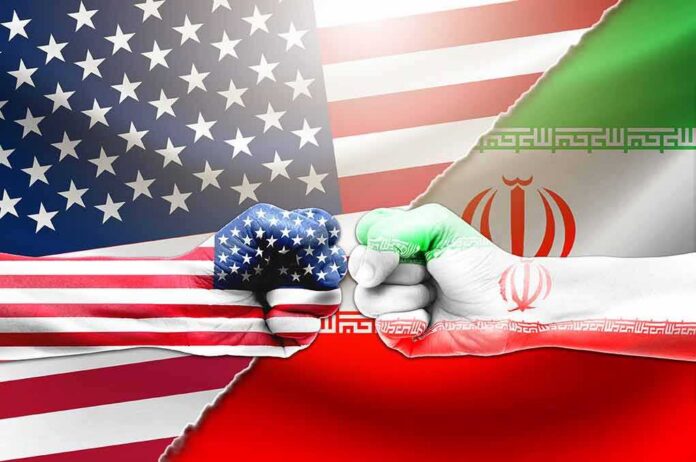 US and Iran flag fists bumping against split flags