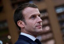 Macron Condemns ‘Insurrection’ – What Sparked It? man in suit looking to the side