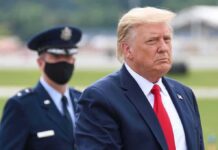 Annihilate Or Agree: Trump Corners Tehran Donald Trump walking outdoors with an officer behind him; Chuck Howley not visible