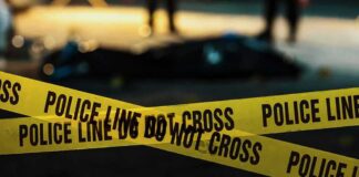 yellow police tape at a nighttime crime scene
