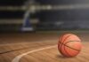 Anthem Exit Sparks Nationwide Backlash A basketball on a wooden court